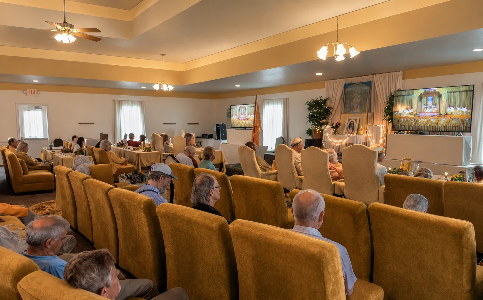Residents gathered at a Vedic Village community event